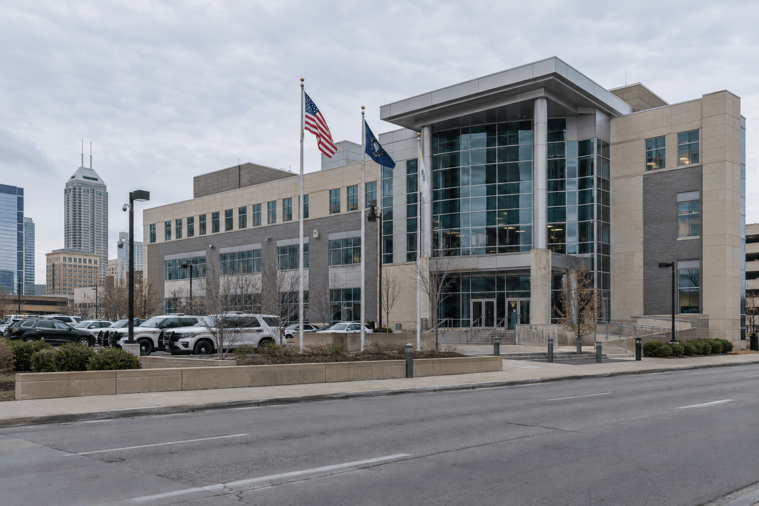 Police building exterior in Indianapolis, where IMPD is investigating the shooting near East 13th Street and North Delaware Street.