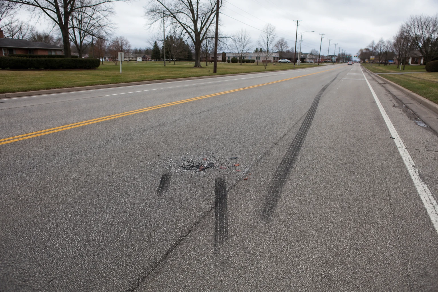 Fort Wayne aggressive-driving crash scene — brake check skid