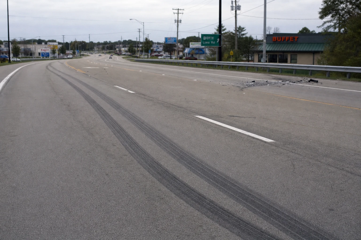 Fort Wayne reckless-driving crash scene — extreme skid marks