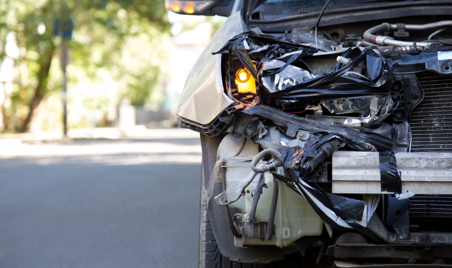 A close-up view of a damaged car.