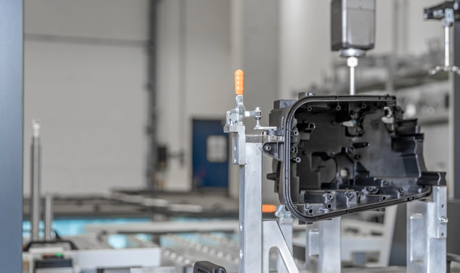 An unknown product is being assembled in a factory.